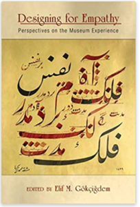 Cover image of Designing for Empathy. The cover is illustrated with Arabic writing in script-style on a gold background.