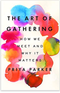 Cover image of The ARt of Gathering. The Title is printed in bold lettering in front of a water color painted circle